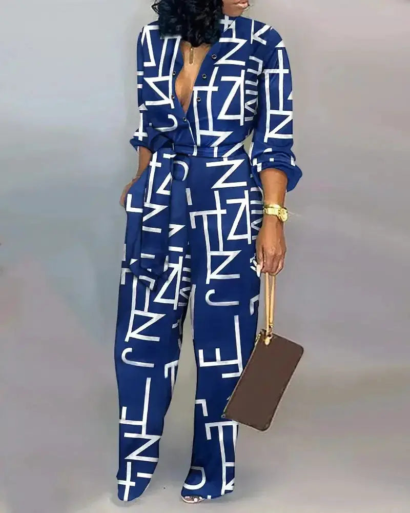Women blue letter-print long-sleeve jumpsuit with belted waist and wide-leg pants, Simples Market.
