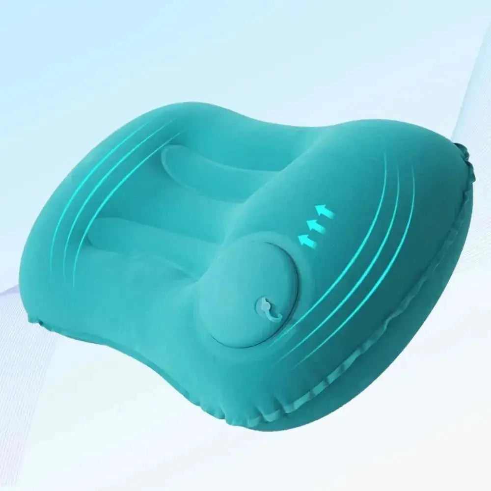 Portable inflatable pillow for neck and lumbar support; teal color, ideal for camping or pool use.
