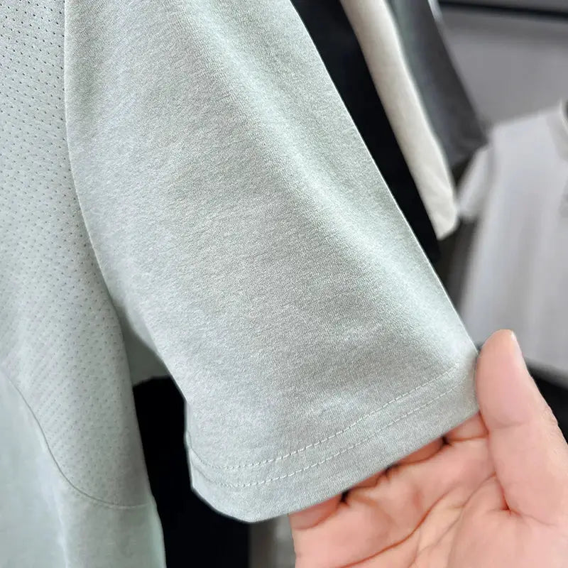 Men's short-sleeve polo shirt in light mint, with neat sleeve-hem stitching