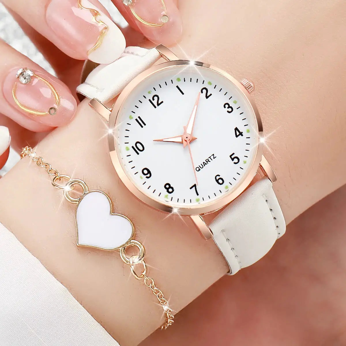 Simples Market rose-gold quartz wristwatch with white leather strap and a white heart bracelet in a 4/6pcs fashion set.