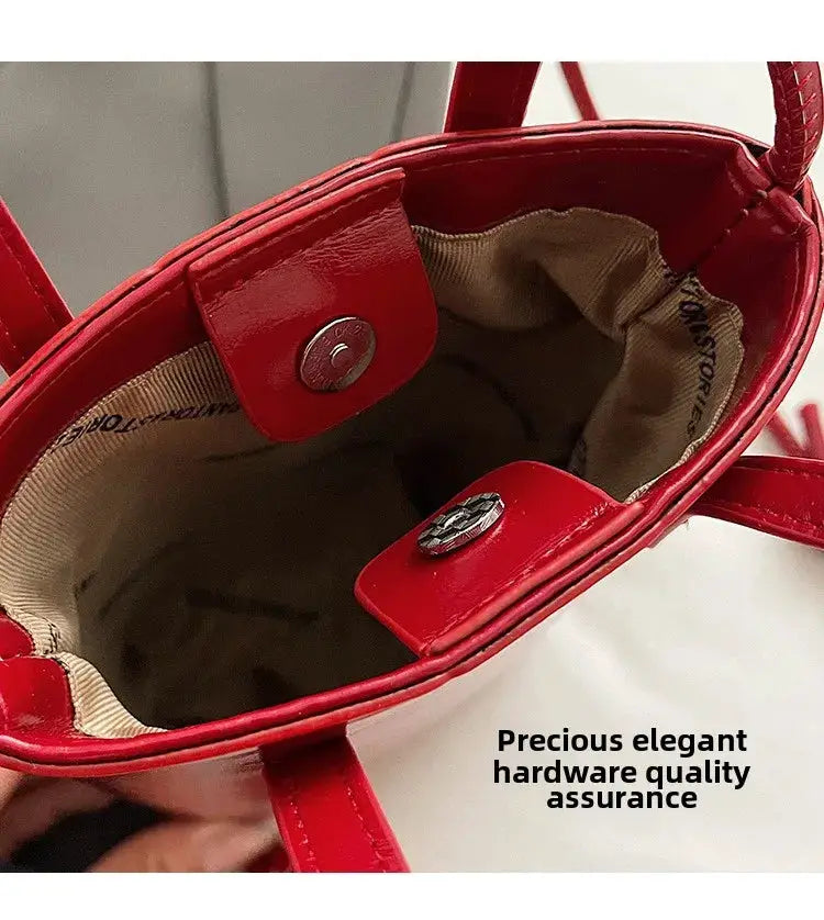 Simples Market PU leather mini crossbody bag in red with beige lining and magnetic snap closure.
