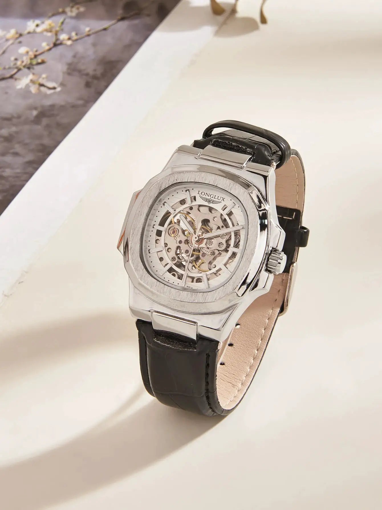 Men's skeleton automatic wristwatch with stainless steel case and black leather strap, LONG LUX dial.