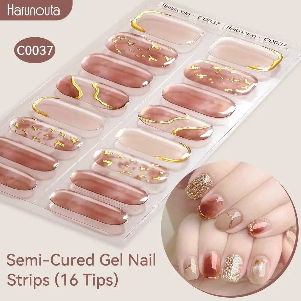 Harunouta gradient auroras semi-cured gel nail strips set with 16 tips in pink-mauve gradient and gold foil accents