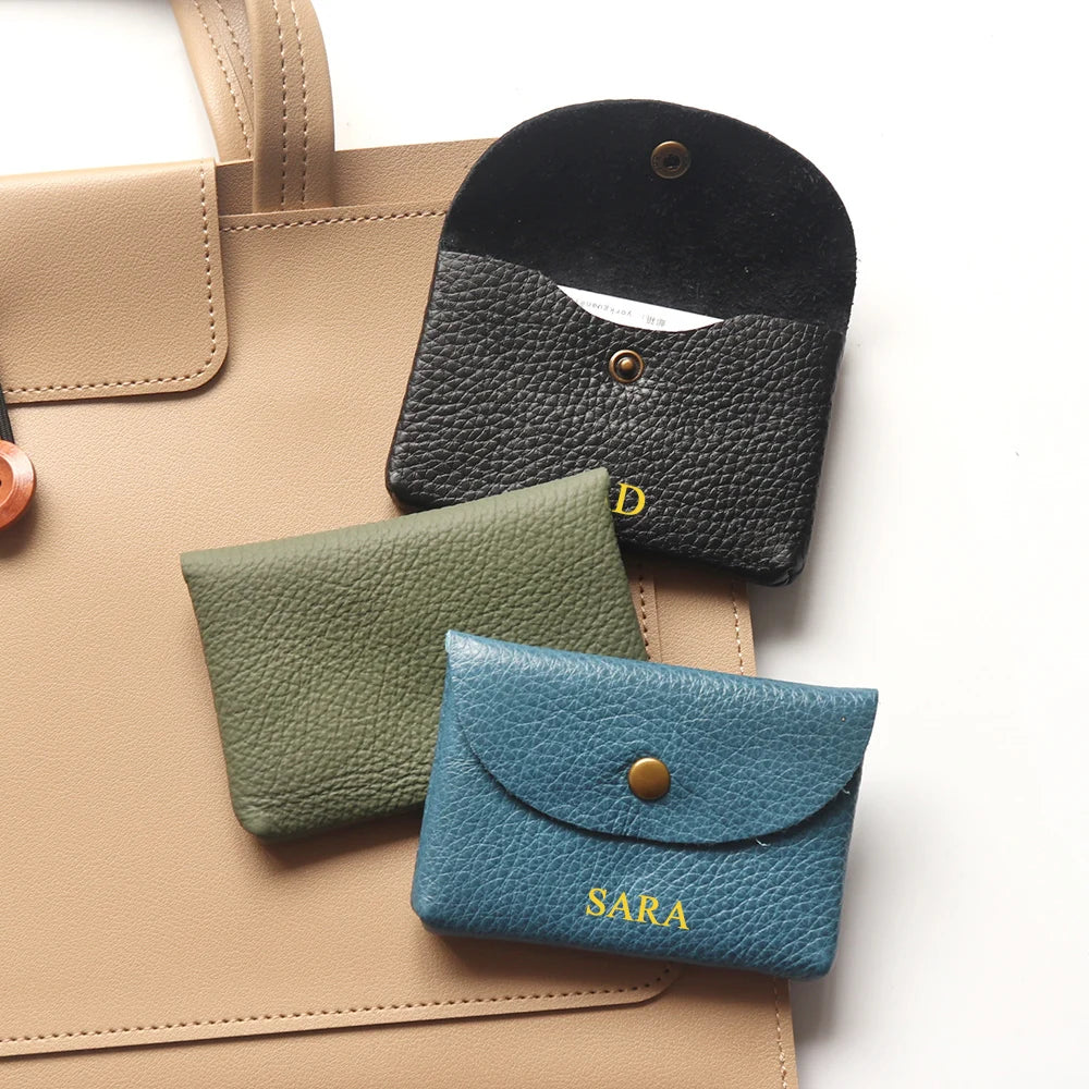 Personalized genuine leather card holder set: blue with SARA engraving, olive green, and black mini envelopes