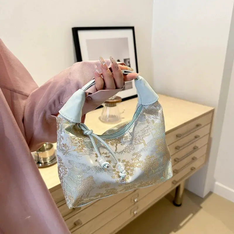 Simples Market Chinese-embroidery handbag; light blue with gold pattern, shoulder/crossbody tote.