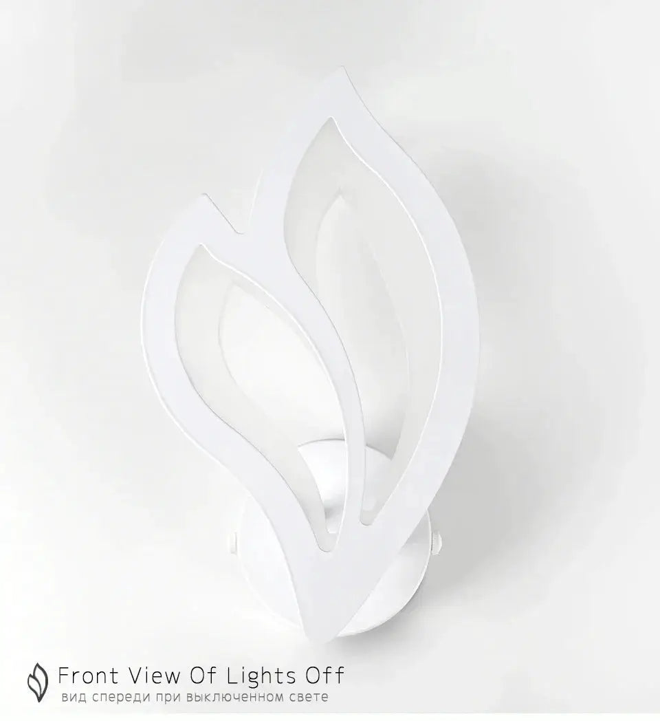 Modern LED wall lamp with a white leaf-shaped sculpture for living room decor