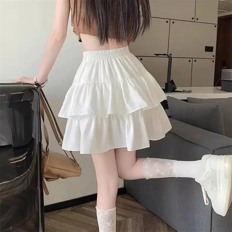Simples Market white tiered mini A-line skirt with high waist and layered ruffles.