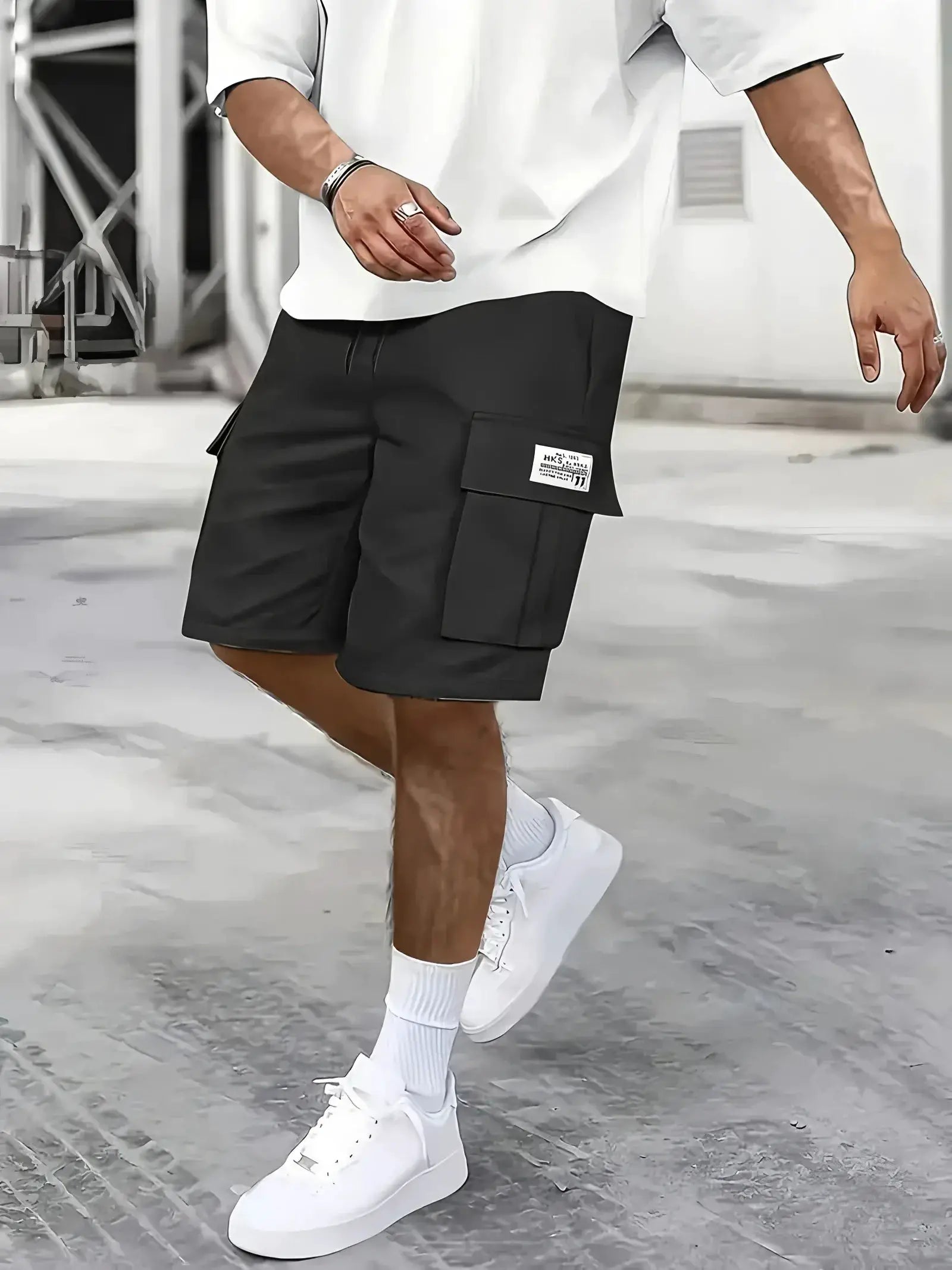 Men's work shorts by Simples Market in black with multiple cargo pockets and elastic waistband.