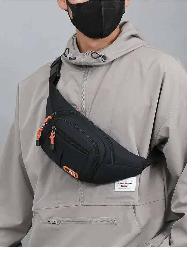 Oxford Waterproof Mobile Waist Bag by Simples Market, black waist pack with orange zipper pulls.