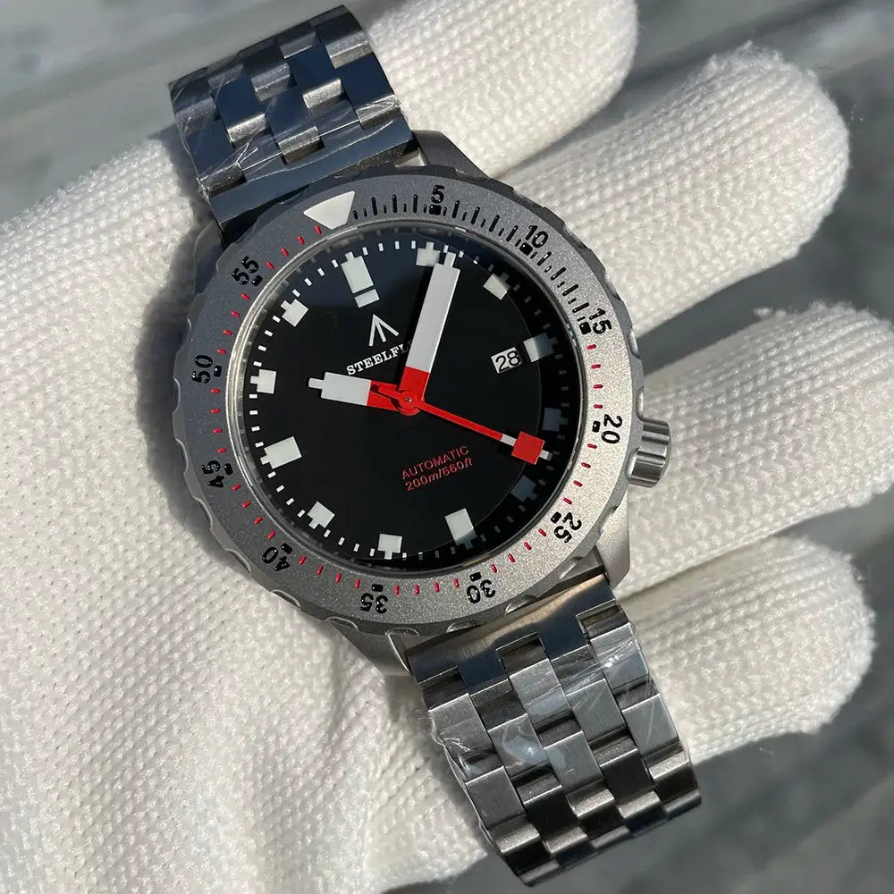 STEELFLIER SF752 automatic dive watch with black dial, date window at 3, red second hand, stainless steel bracelet
