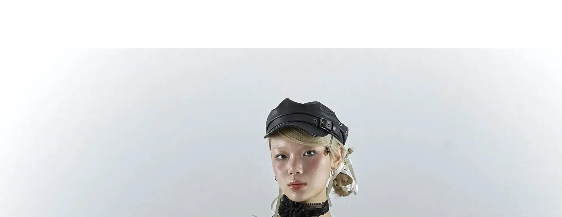 Karrcat Gothic Black Lace Shirt on model, with black cap and lace neck detail for dark emo fashion.