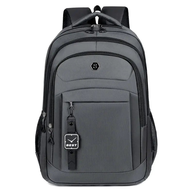 Gray Simples Market travel backpack with multiple compartments and mesh side pockets