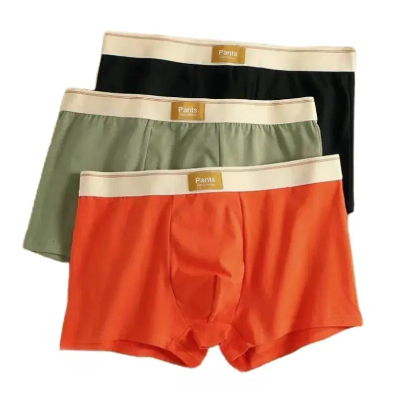 3-pack men's cotton boxer shorts by Simples Market in orange, olive green, and black with beige waistbands