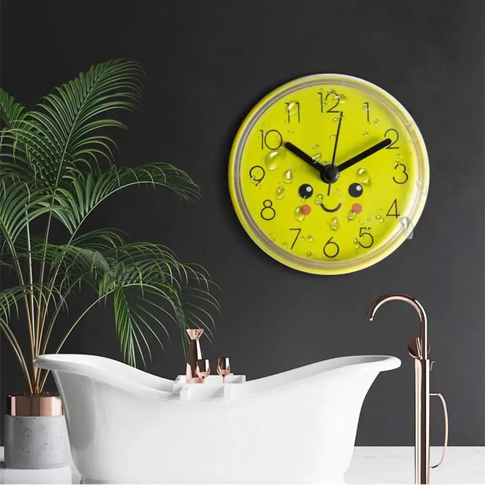 Mini suction-cup yellow wall clock with a cute face; anti-fog, waterproof 7cm for bathroom.