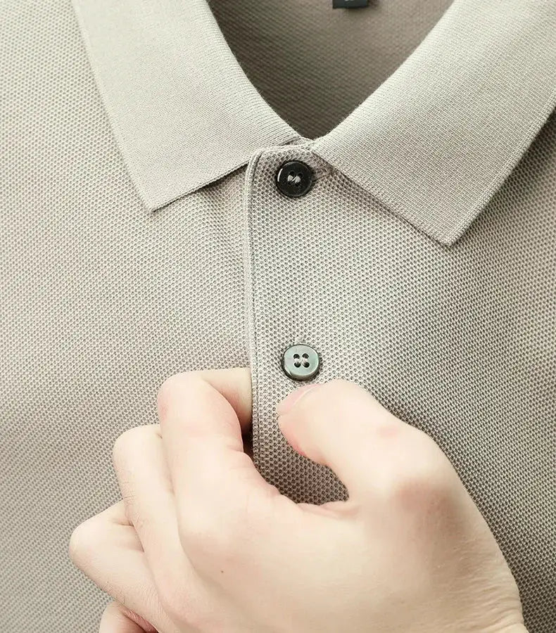 Men's polo shirt by Simples Market; beige 100% cotton knit with polo collar and button placket.