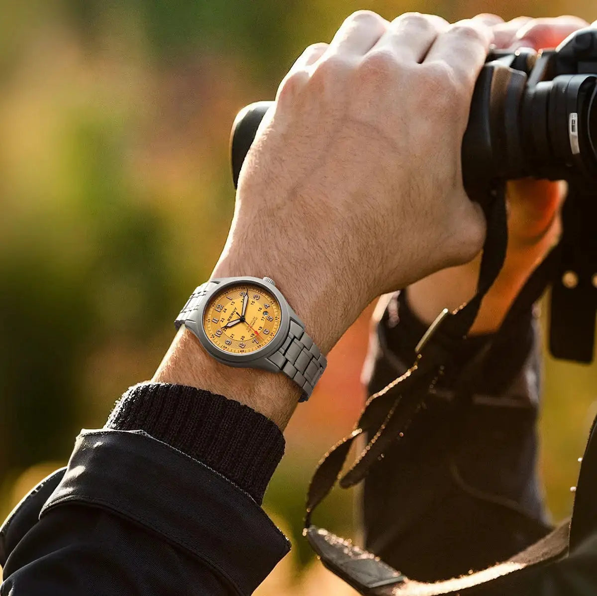 BERNY automatic full titanium men's watch with gray bracelet and tan dial.