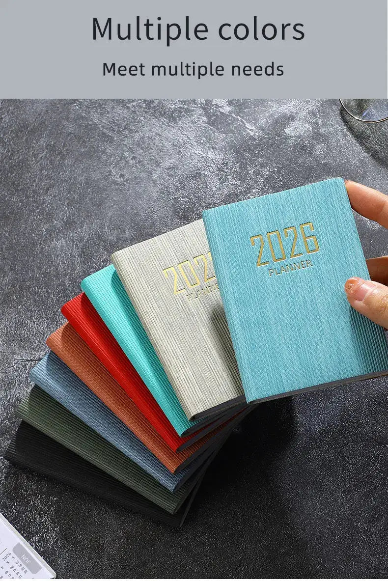 A7 mini pocket daily schedule planner set in multiple colors; 2026 planner with gold foil 2026 PLANNER on textured covers