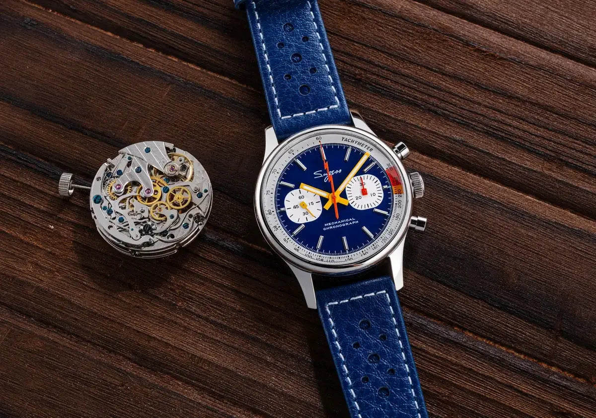 Sugess chronograph watch for men with blue dial, white subdials, orange hands, sapphire crystal, blue perforated strap