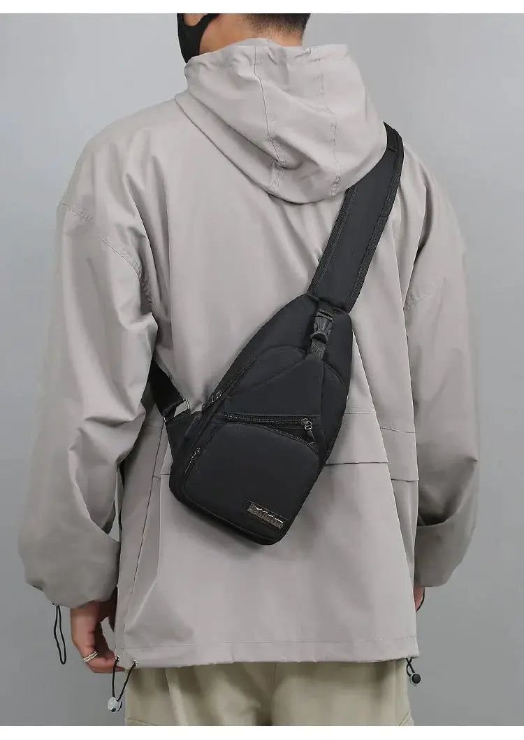 Men's chest bag by Simples Market; canvas black lightweight crossbody with zip pockets