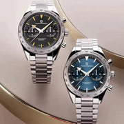 Two Pagani Design men's retro luxury chronograph watches with stainless steel bracelets and black and blue dials.