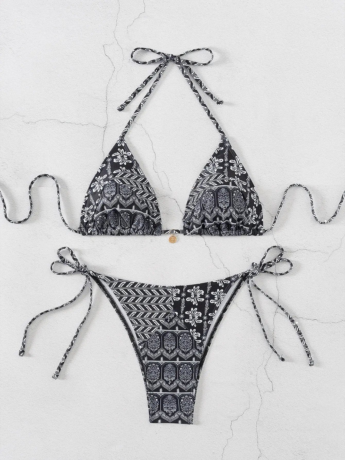 Simples Market triangle bikini set in black and white floral print with halter top and Brazilian bottom