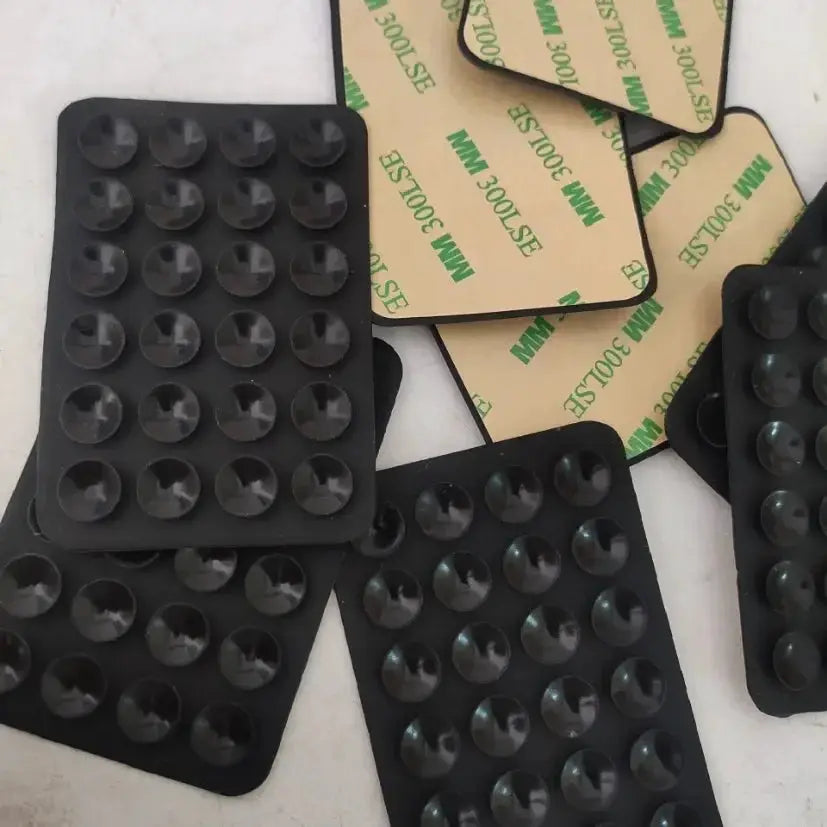 GripTech Silicone Suction Phone Holder Mat Multifunctional Wall Stand With 24 Square Suction Cups For Secure Mounting