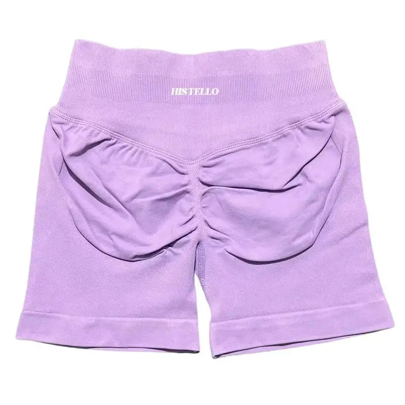 HISTELLO purple sports shorts, low-waist seamless scrunch back fit for women; breathable, stretchy gym/yoga shorts.