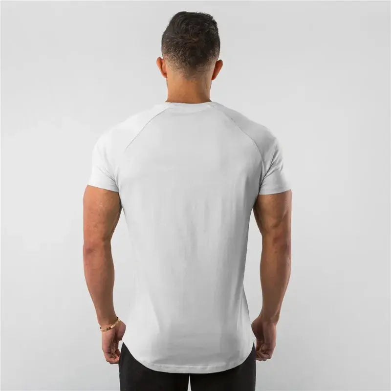 Men's white cotton fitness T-shirt, short sleeves, slim fit with curved hem