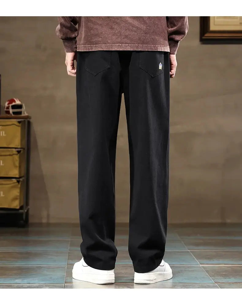 HIQOR men's casual black cotton pants with loose wide-leg fit, back pockets and small logo patch