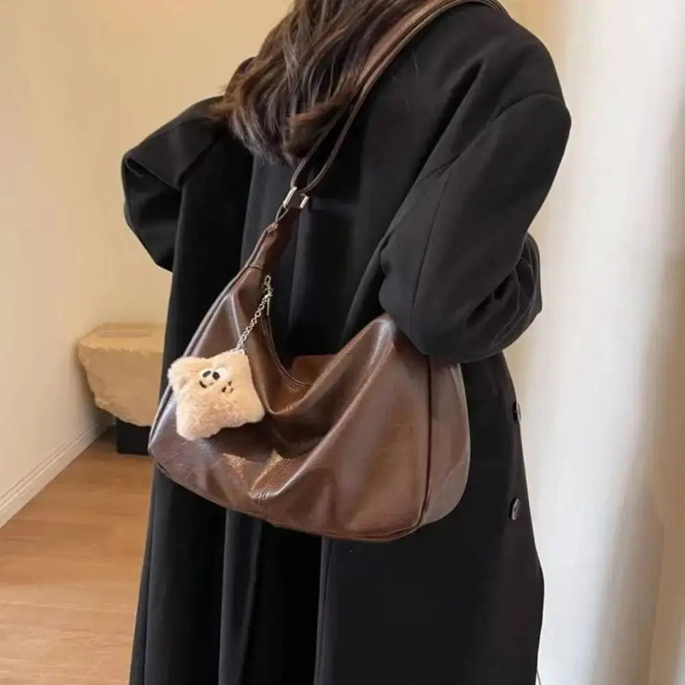 Slouchy shoulder bag in brown PU leather, large capacity by Simples Market with plush keychain