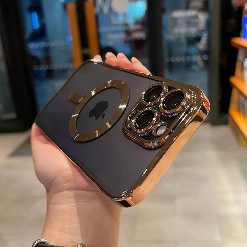 Luxury magnetic clear iPhone case with rose-gold edges and MagSafe ring, shockproof.
