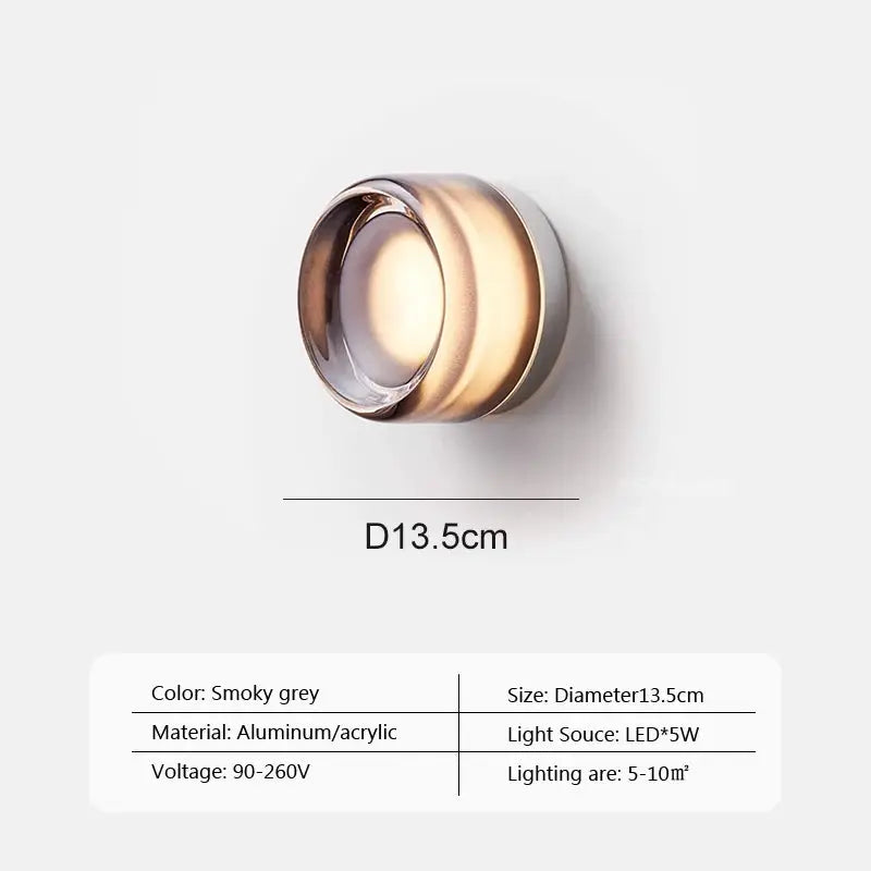 Modern LED wall lamp by Simples Market, smoky grey aluminum/acrylic fixture, diameter 13.5 cm.