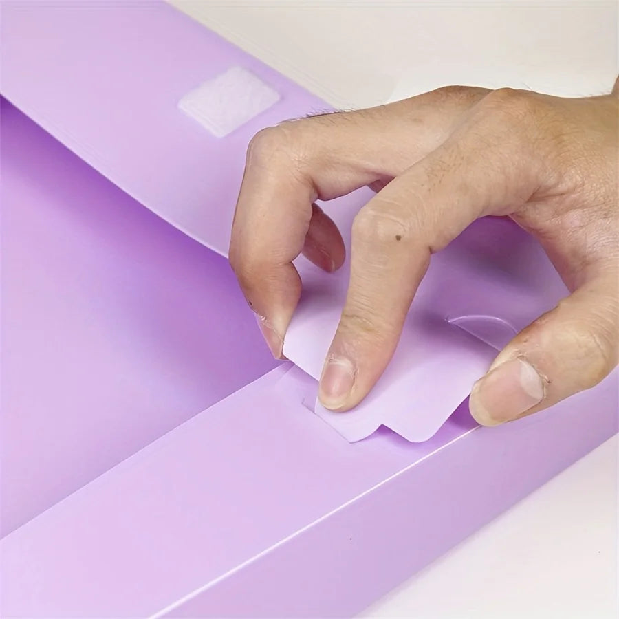 Morandi file box in lavender plastic; A4 document folder being opened.