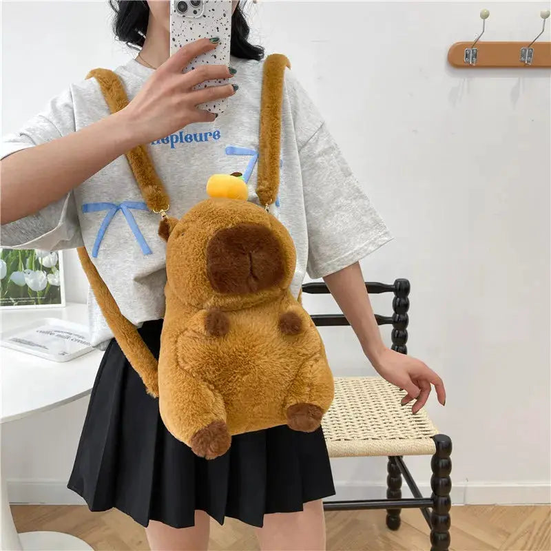 Capybara plush backpack in brown fur with crossbody straps