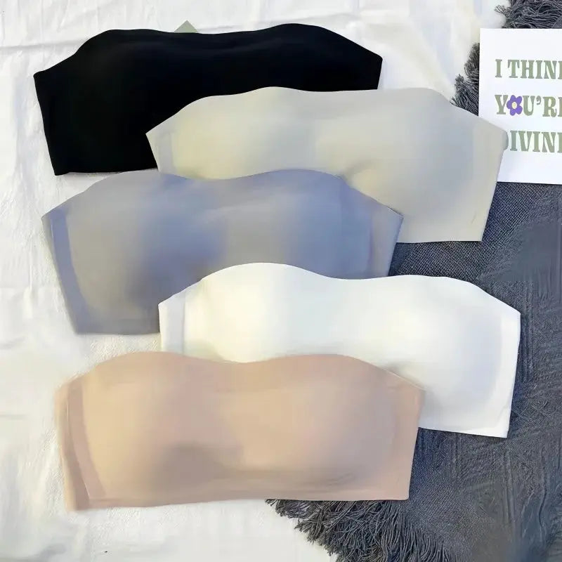 Five bandeau bras in black, nude, gray, white and beige; strapless, seamless and non-wire.