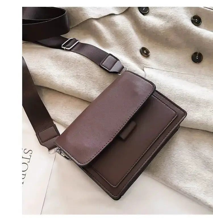 Crossbody bag in brown PU leather with front flap and adjustable strap