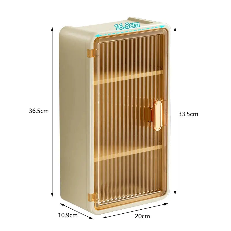 Bathroom storage cabinet by Simples Market with amber ribbed door and gold handle