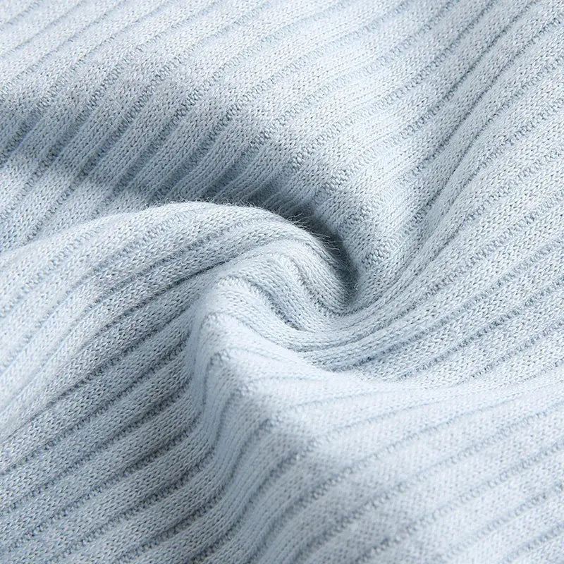 Knitted blue striped fabric close-up with a soft textured surface