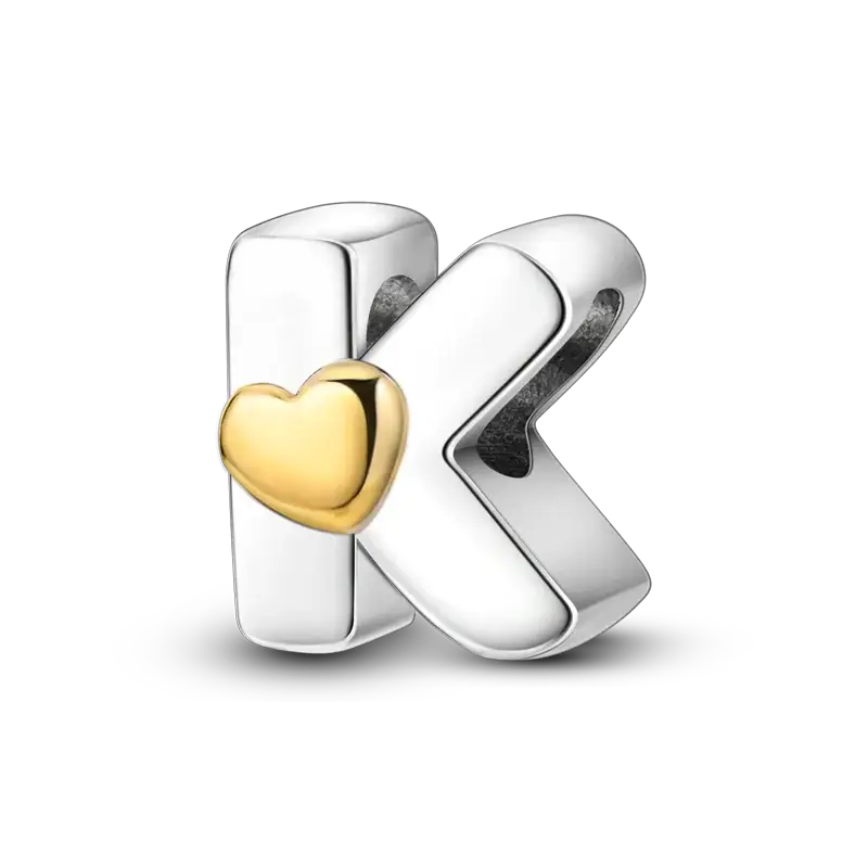 K-shaped charm with a gold heart accent on silver-tone metal