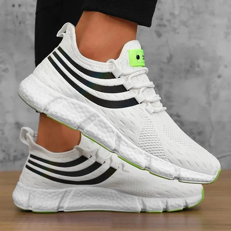 Men's casual sports sneakers, white with black stripes and lime green accents; breathable, lightweight, anti-slip sole.
