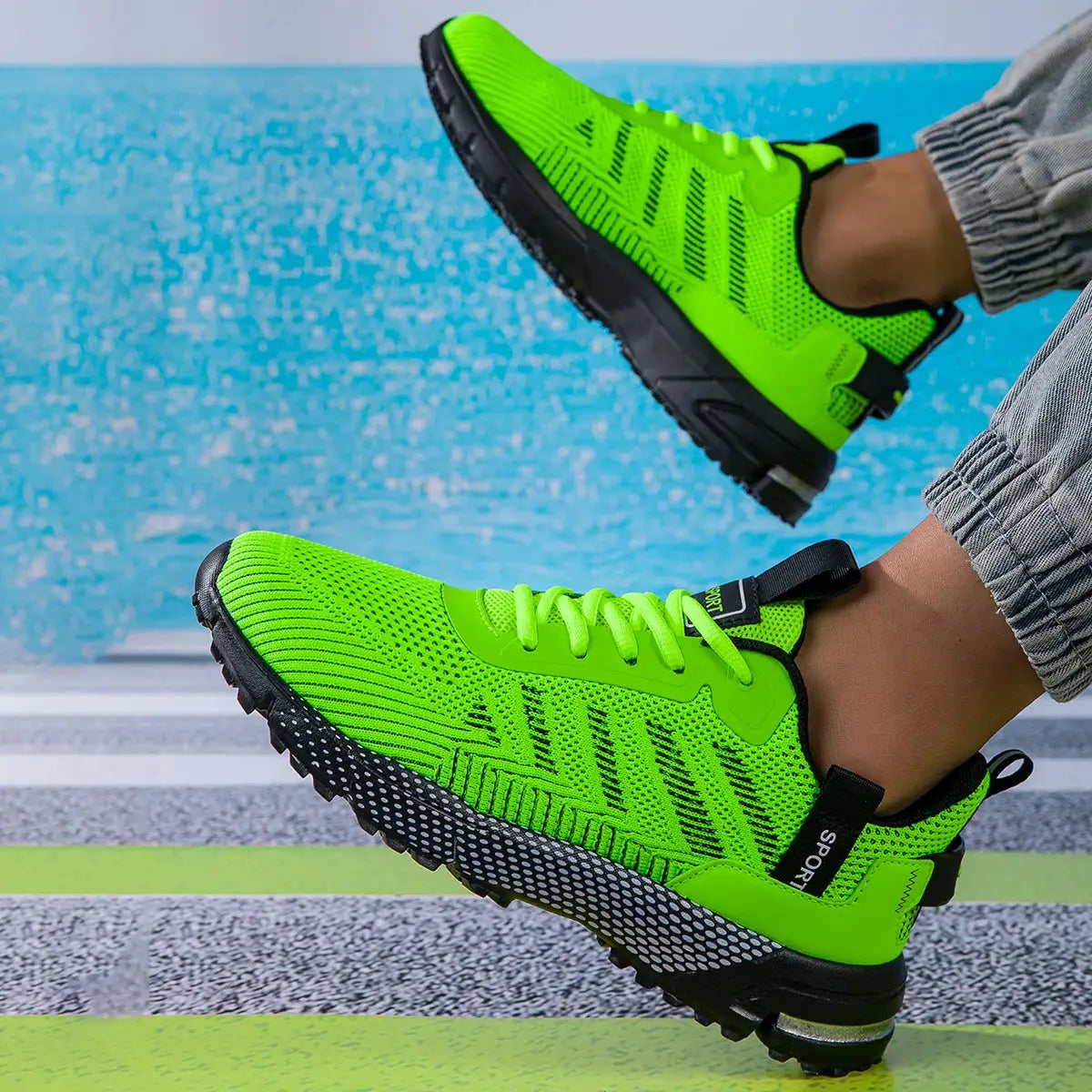 Men's neon green running shoes, pair, breathable mesh upper, lace-up design, black non-slip outsole for performance