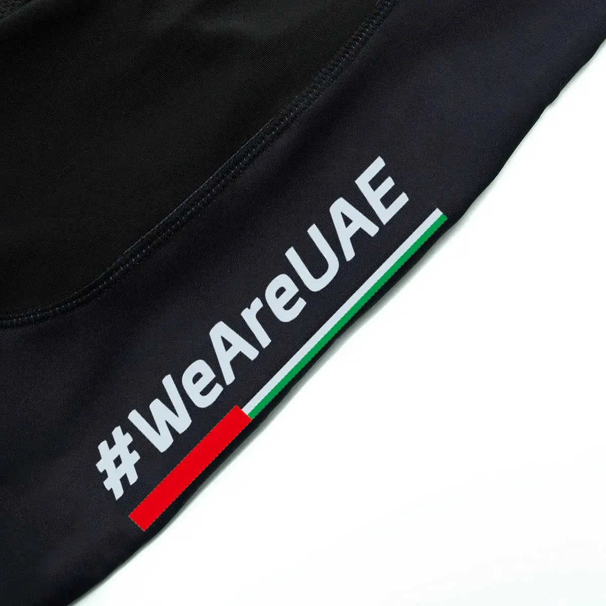 UAE cycling jersey, black short-sleeve with white #weareUAE text and green-red stripe