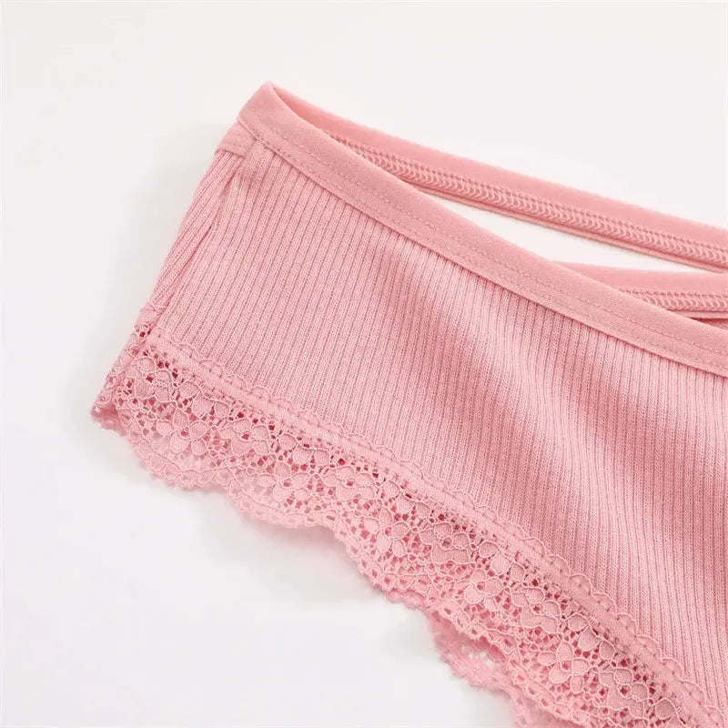 Pink ribbed cotton women's briefs with lace trim, close-up product shot
