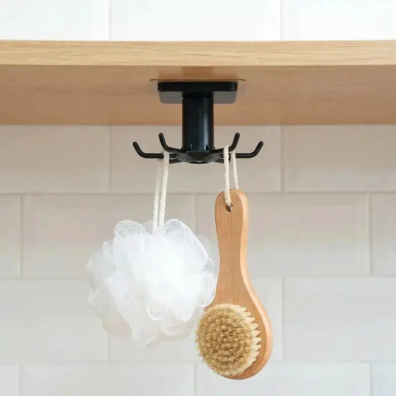 360 rotating kitchen hooks adhesive utensil organizer rack with 6 hooks, black under-cabinet mount, two hanging items.