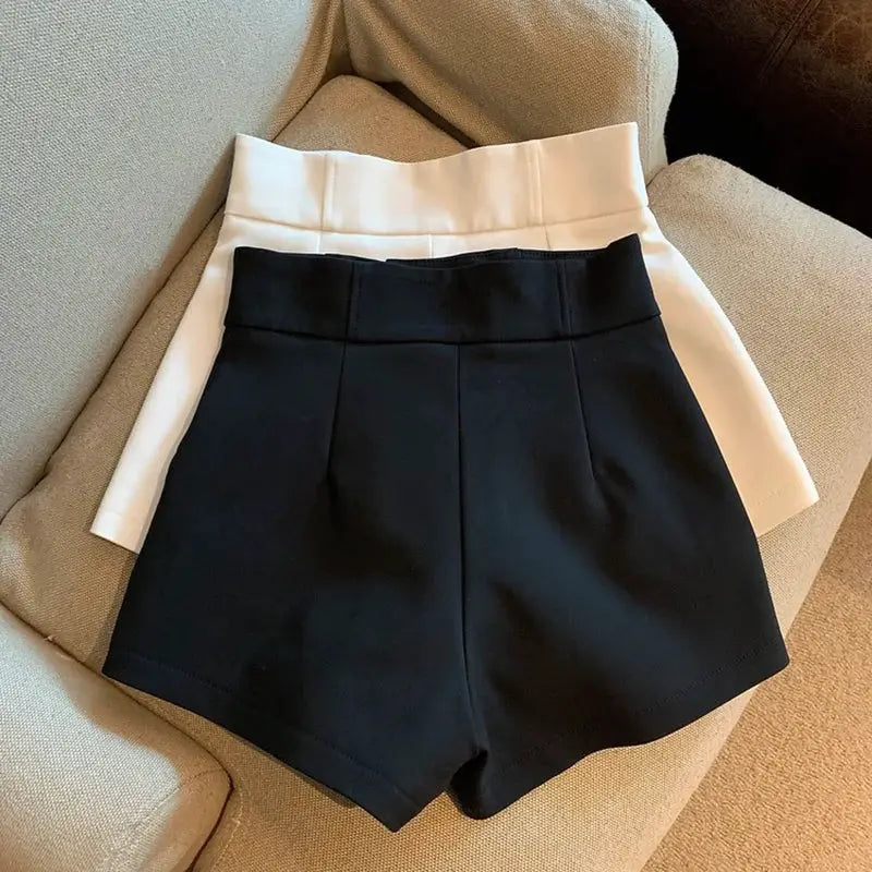 Women's shorts: two high-waisted pairs in black and white, A-line casual style
