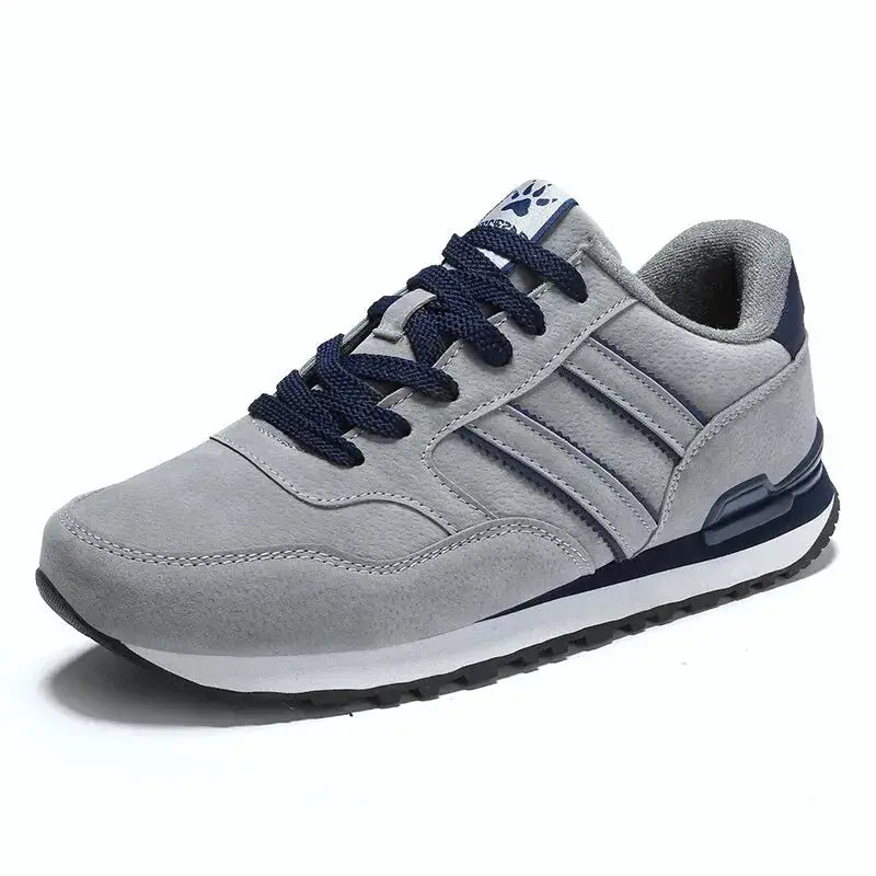 Men's casual sneaker by Simples Market in grey artificial leather with navy laces and white sole.