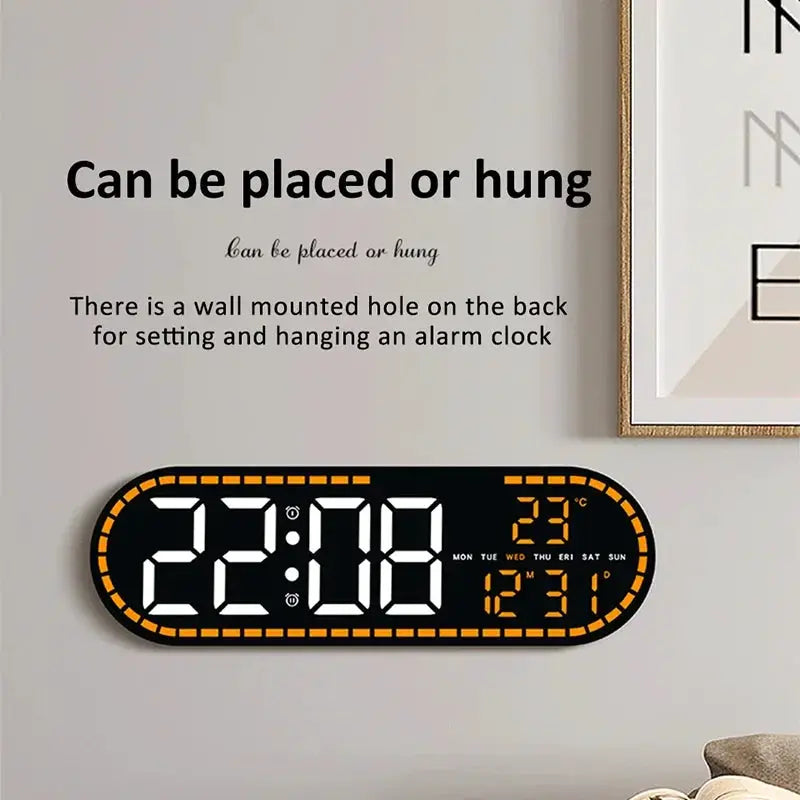 Digital LED wall clock with two alarms, temperature, date and weekday; black oval with orange border, Simples Market.