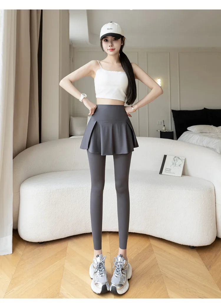 Women’s fake two-piece leggings with attached skirt; grey high-waist seamless leggings with pockets