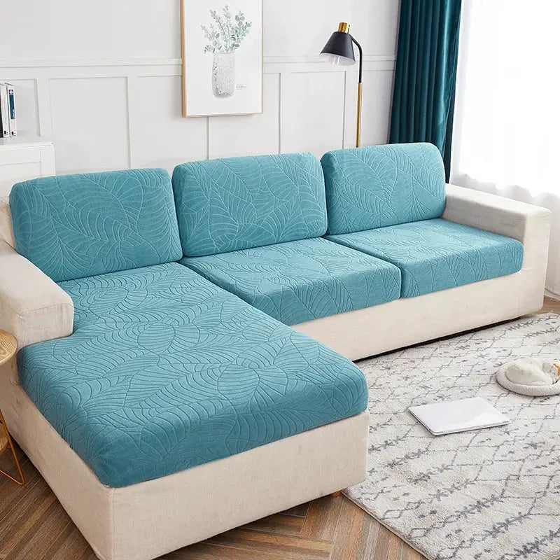 Simples Market waterproof stretch couch cushion cover in teal blue with a leaf pattern for sofa.
