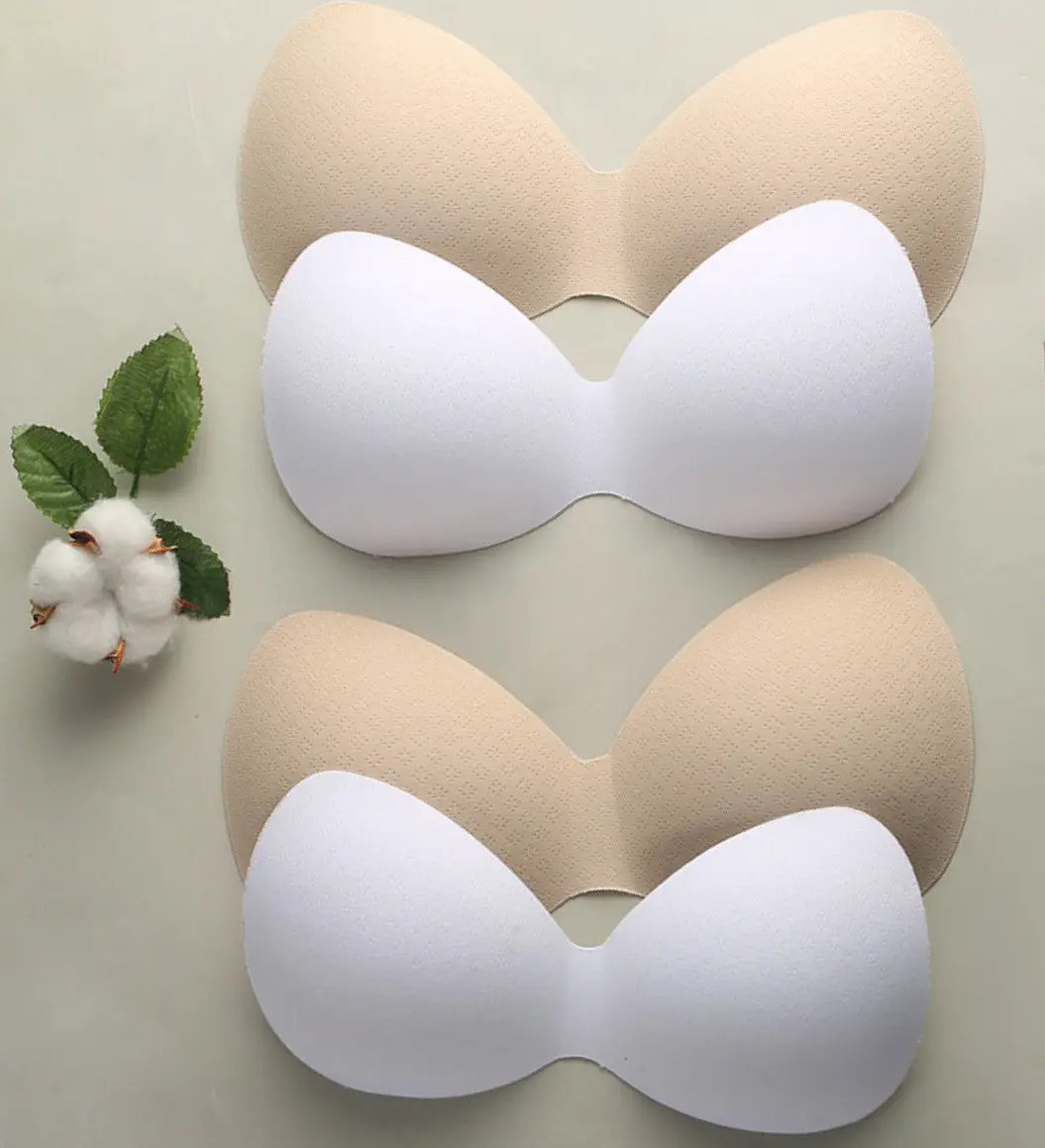 Women swimsuit padding inserts by Simples Market; sponge foam bra pads beige and white pair